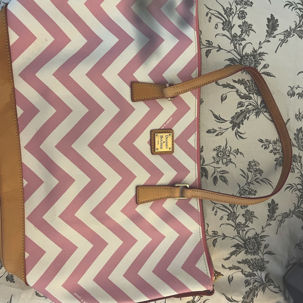 Dooney & Bourke Chevron Pink Tote. Does have mark on top of purse.